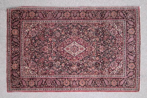 A Meshad rug of Kashan design woven