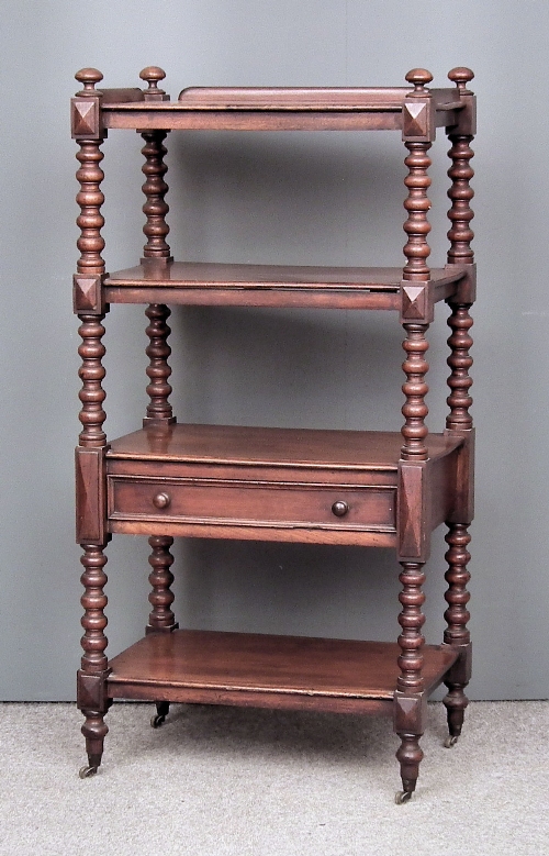 A Victorian mahogany four tier