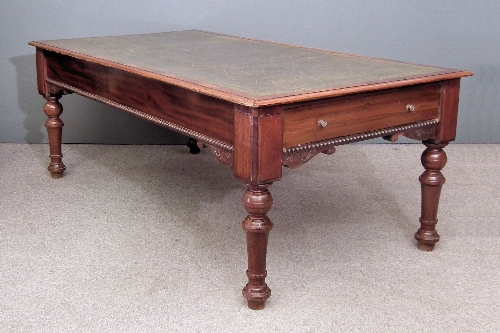 A Victorian mahogany library table