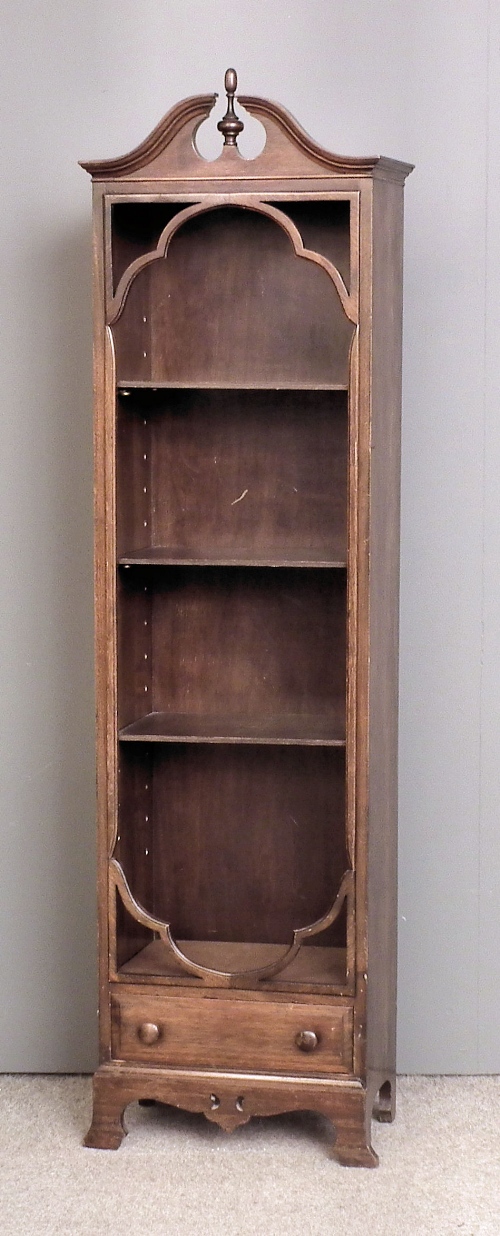 A mahogany open front bookcase