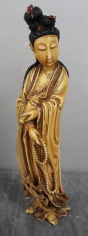 Asian Ivory of a Woman Holding 15d9fa