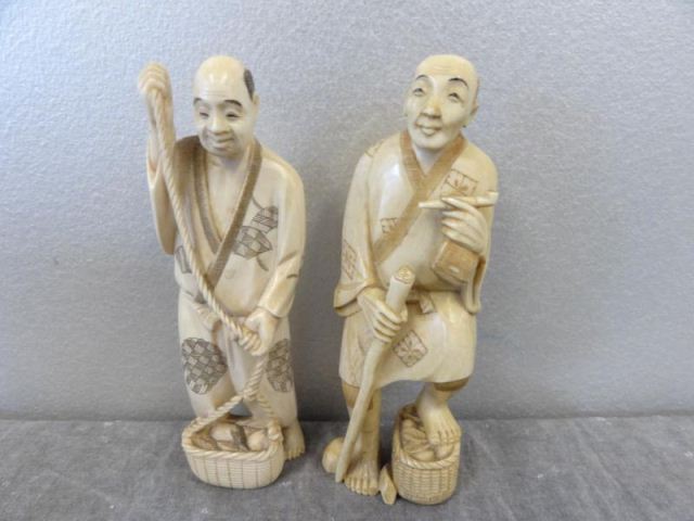 2 Signed Asian Ivories.A man with