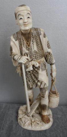 Signed Asian Ivory of Man Carrying Basket.Incised