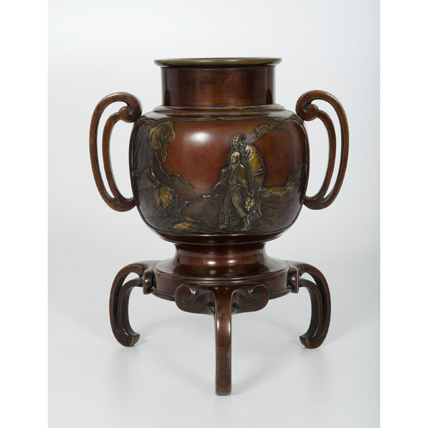 Bronze Vase Asian. A bronze vase on