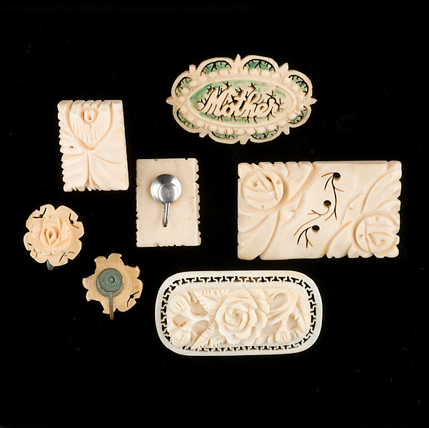 Grouping of Ivory Ear Clips and 161411