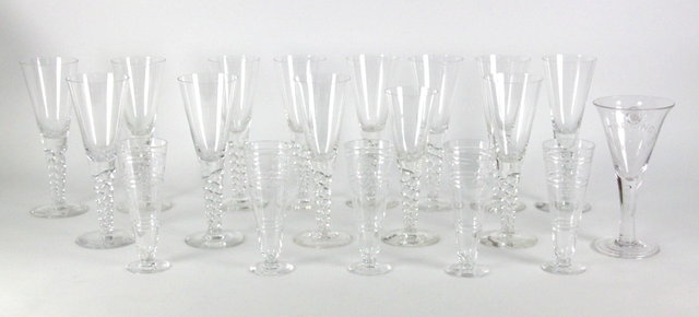 Twelve glass champagne flutes with