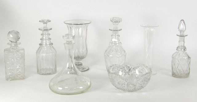 Four cut glass decanters and stoppers