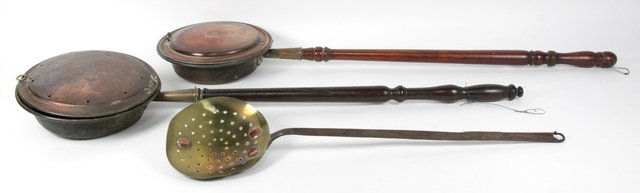 Two copper warming pans and a brass