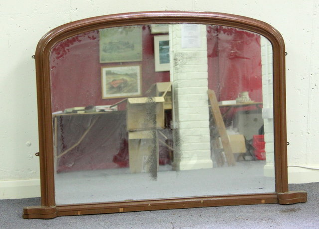 An overmantel mirror the arch glass