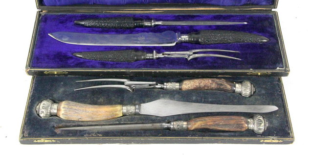 A silver mounted carving set with