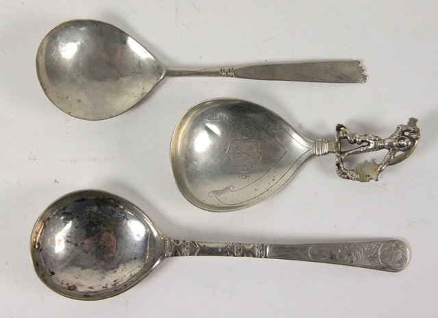 Three Continental white metal spoons