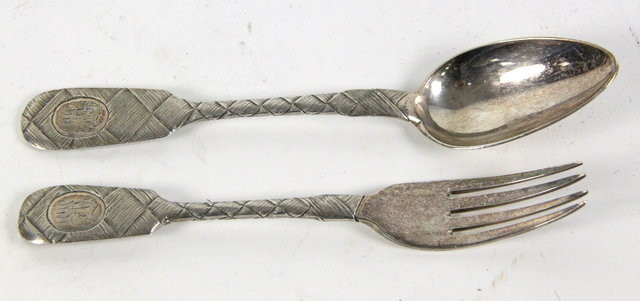 A Russian silver spoon and fork