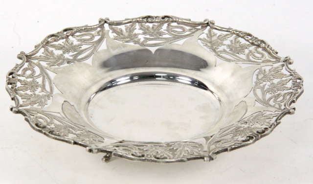An Egyptian white metal dish with