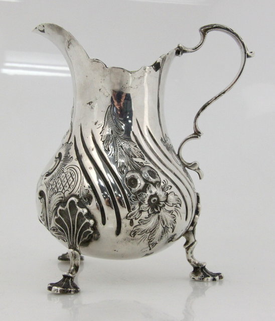 A Victorian silver jug makers mark