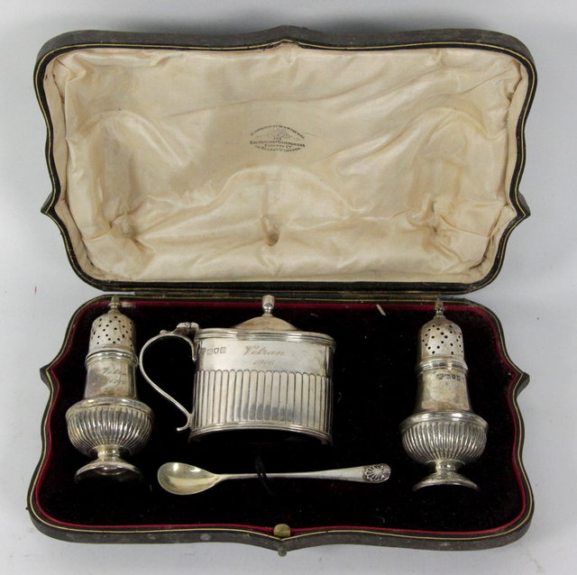 A silver cruet set Goldsmiths & Silversmiths