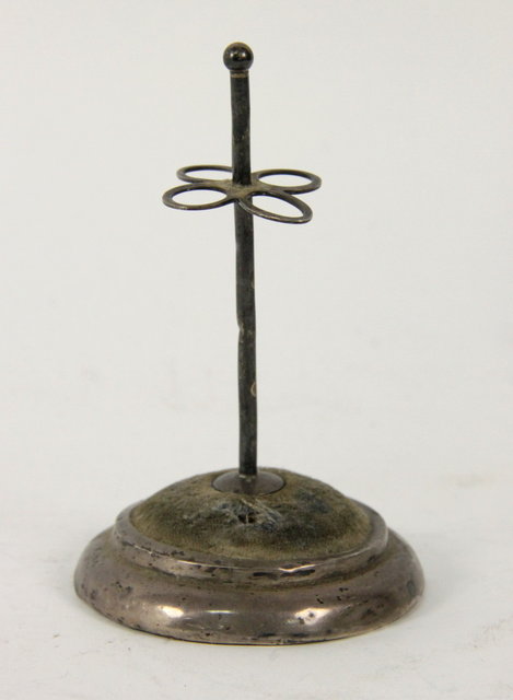 A silver mounted hat pin stand