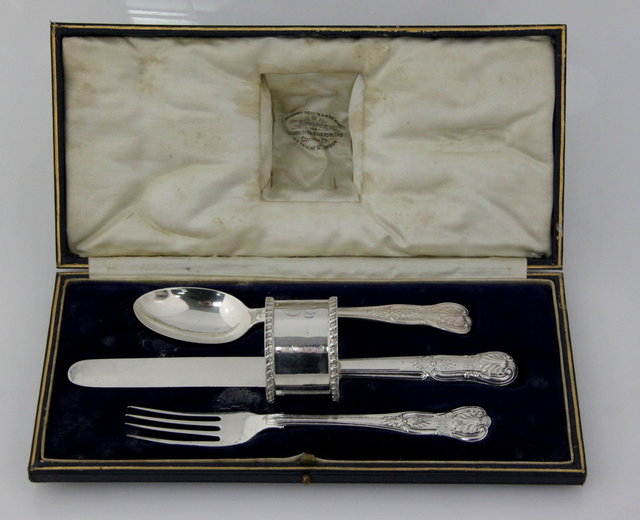 A silver christening knife fork spoon