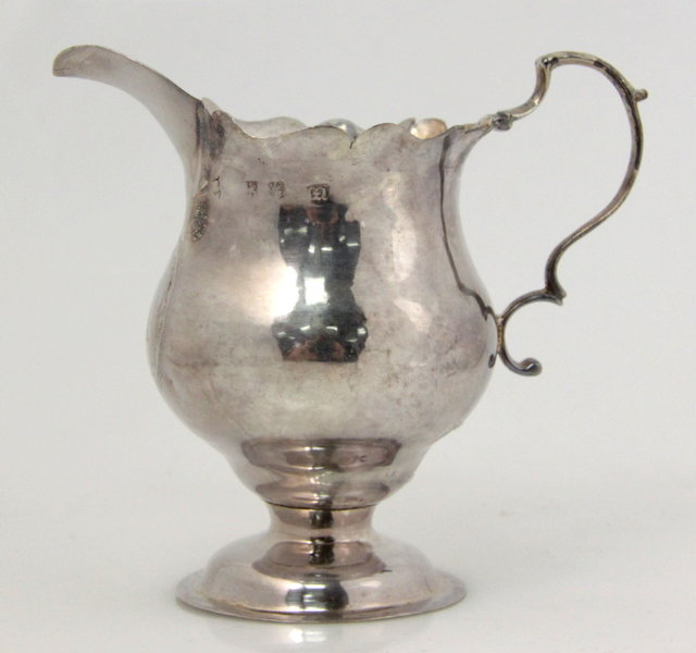 A George III silver jug maker's