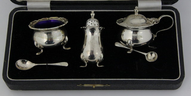 A three piece silver cruet set 161702