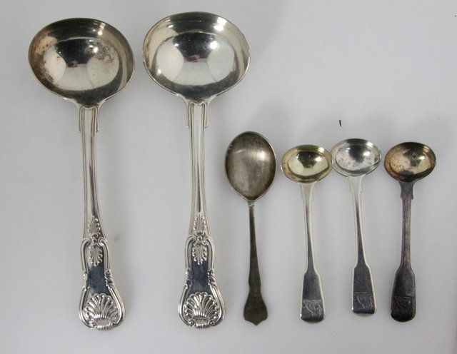 A pair of Kings pattern sauce ladles