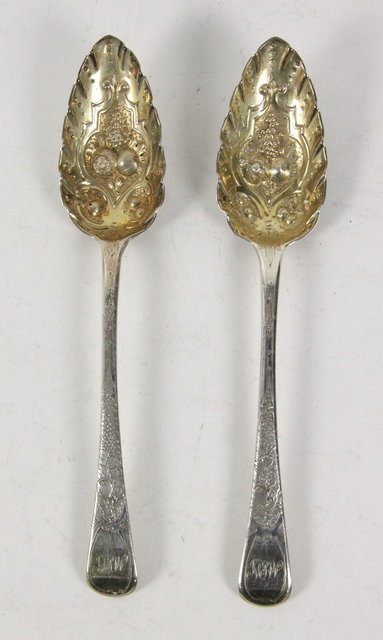 A pair of George III silver berry 161718