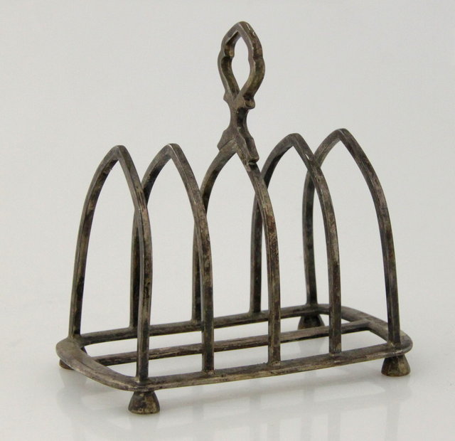 A silver five-bar toast rack by