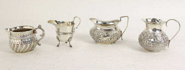 A silver cream jug London 1896