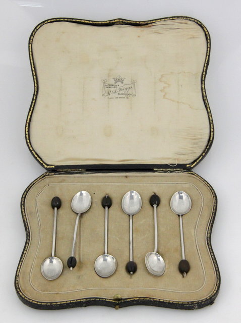 A boxed set of six silver coffee