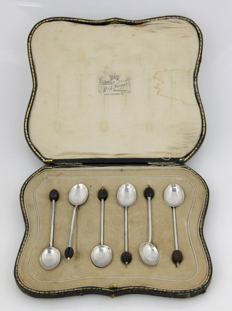 A boxed set of six silver coffee spoons