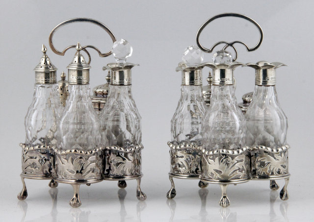 A pair of silver cruet stands Thomas 161774