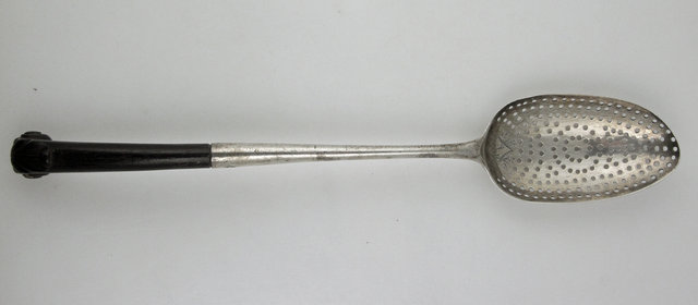 A George III silver drainer spoon