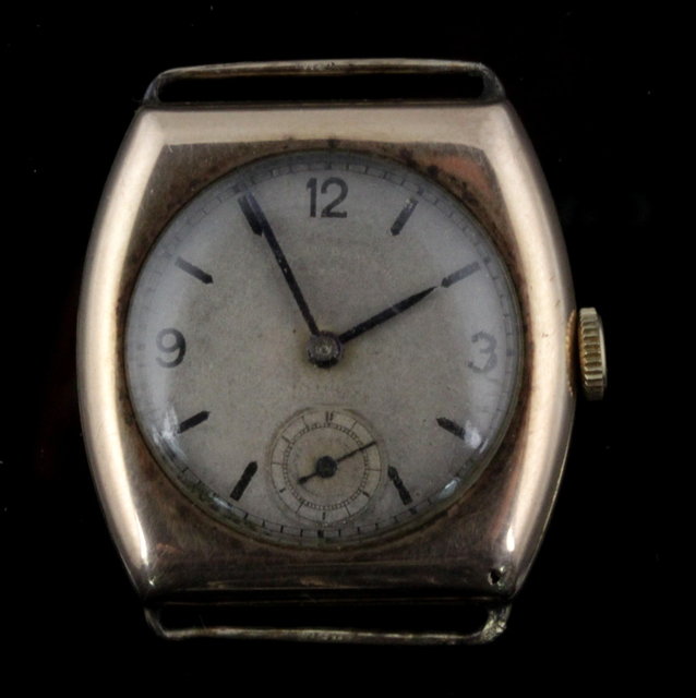 A gold wristwatch circa 1930 with plain