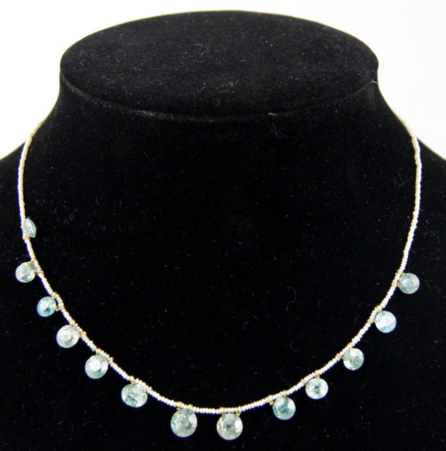 A seed pearl necklet hung thirteen 1617b0