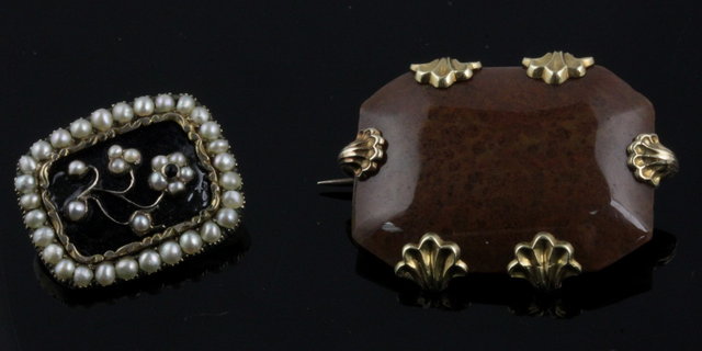 A split pearl and enamel mourning brooch