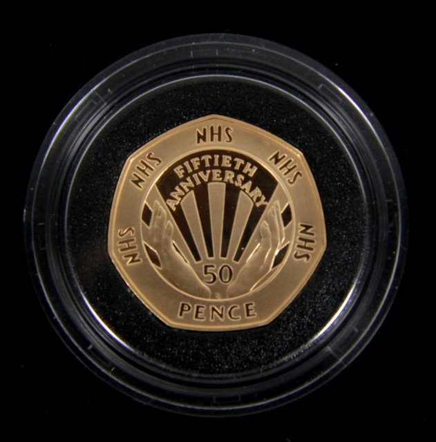 A Gold Proof fifty pence coin commemorating