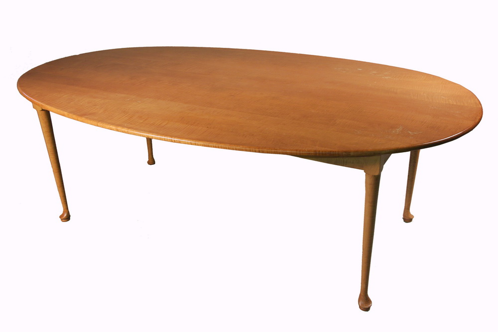 CUSTOM OVAL TIGER MAPLE DINING TABLE