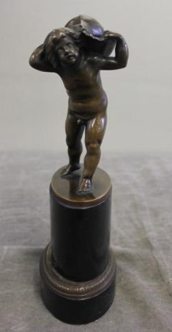 Figural Bronze of Cherub Burdened