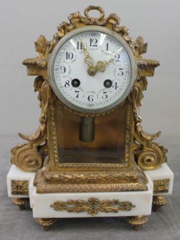 Gilt Metal and Marble Clock.From a Garden