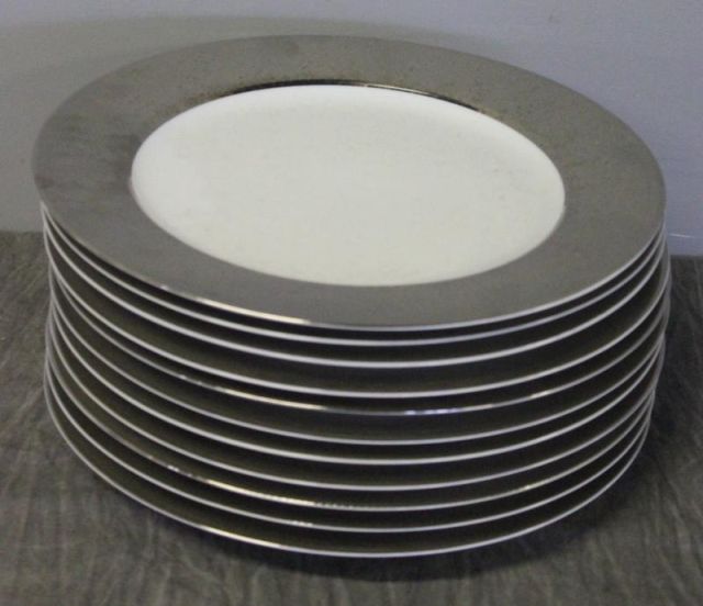 11 Christofle Dinner Plates.From