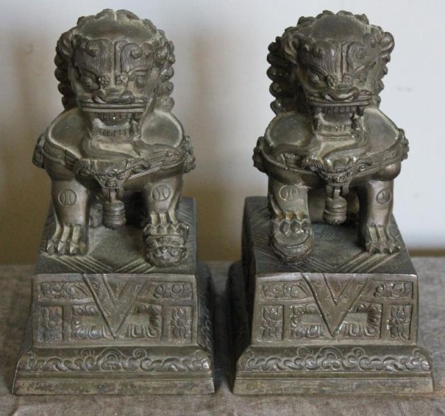 Pair of Chinese Bronze Foo Dogs on Plinth