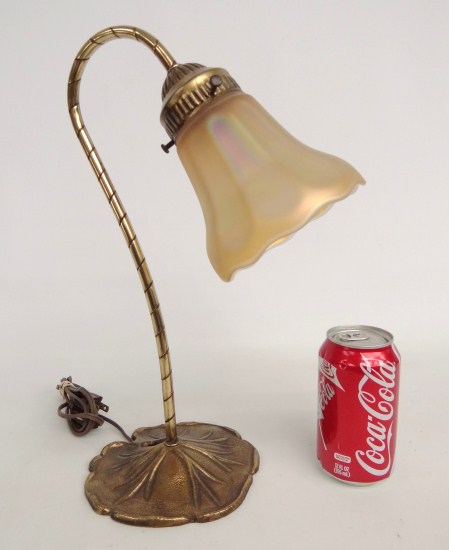 Desk lamp with Carnival glass shade.