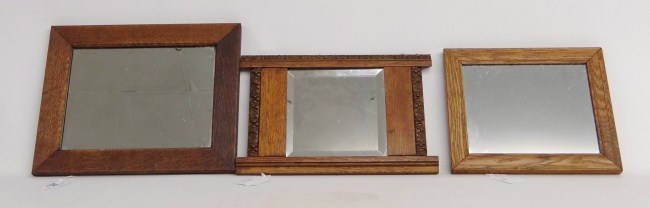 Lot three oak mirrors.