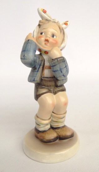 Hummel figurine girl with scarf.