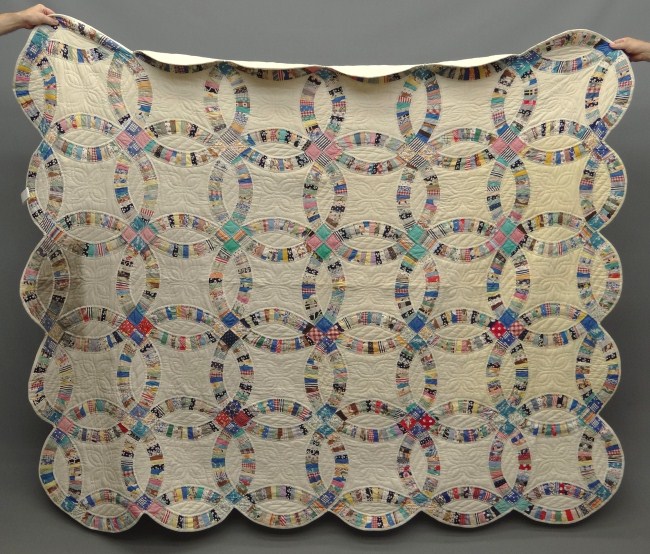 C. 1940's Double Wedding Ring quilt.