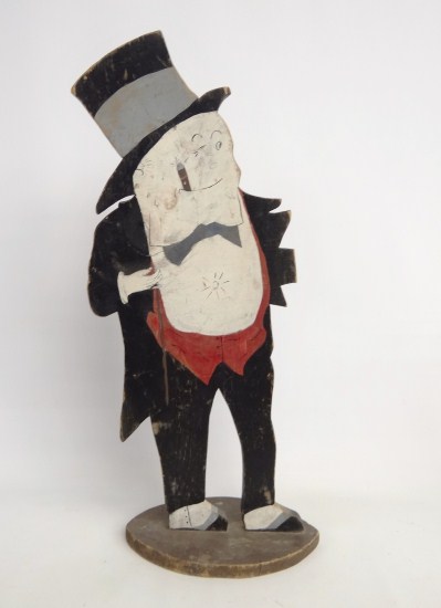 Vintage painted figure with cigar.