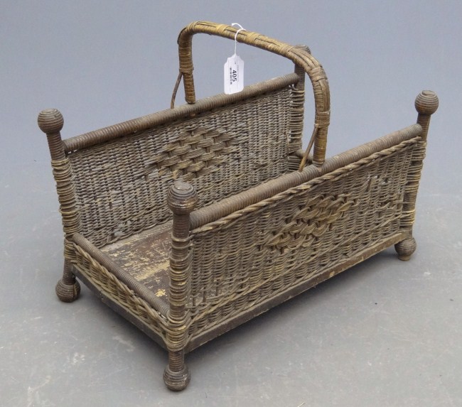 C. 1900' s wicker magazine rack.