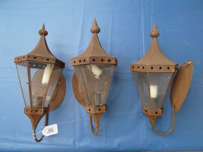 Lot three tin lanterns. Rusted.