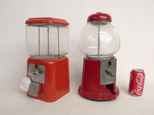 Lot two vintage one cent peanut machines.