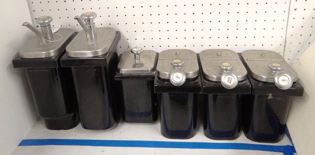 Lot six vintage syrup dispensers.