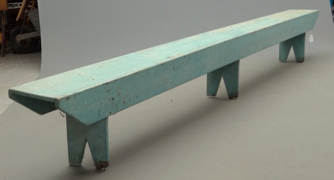 Long bootjack bench in blue paint.